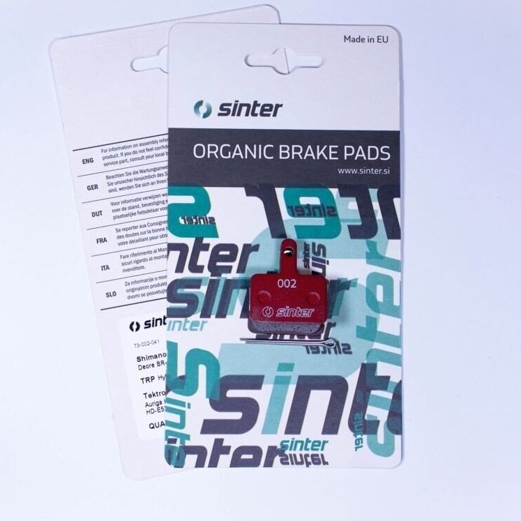Disc brake pads Sinter 002 Shimano B, organic, MTB Standard, red, set 2 Disc brake pads Sinter 002 Shimano B, organic, MTB Standard, red, set 2